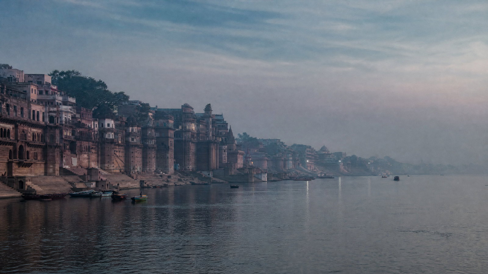 Soft dawn light over the sandstone courtyards and bulbous domes of Fatehpur Sikri in Uttar Pradesh.