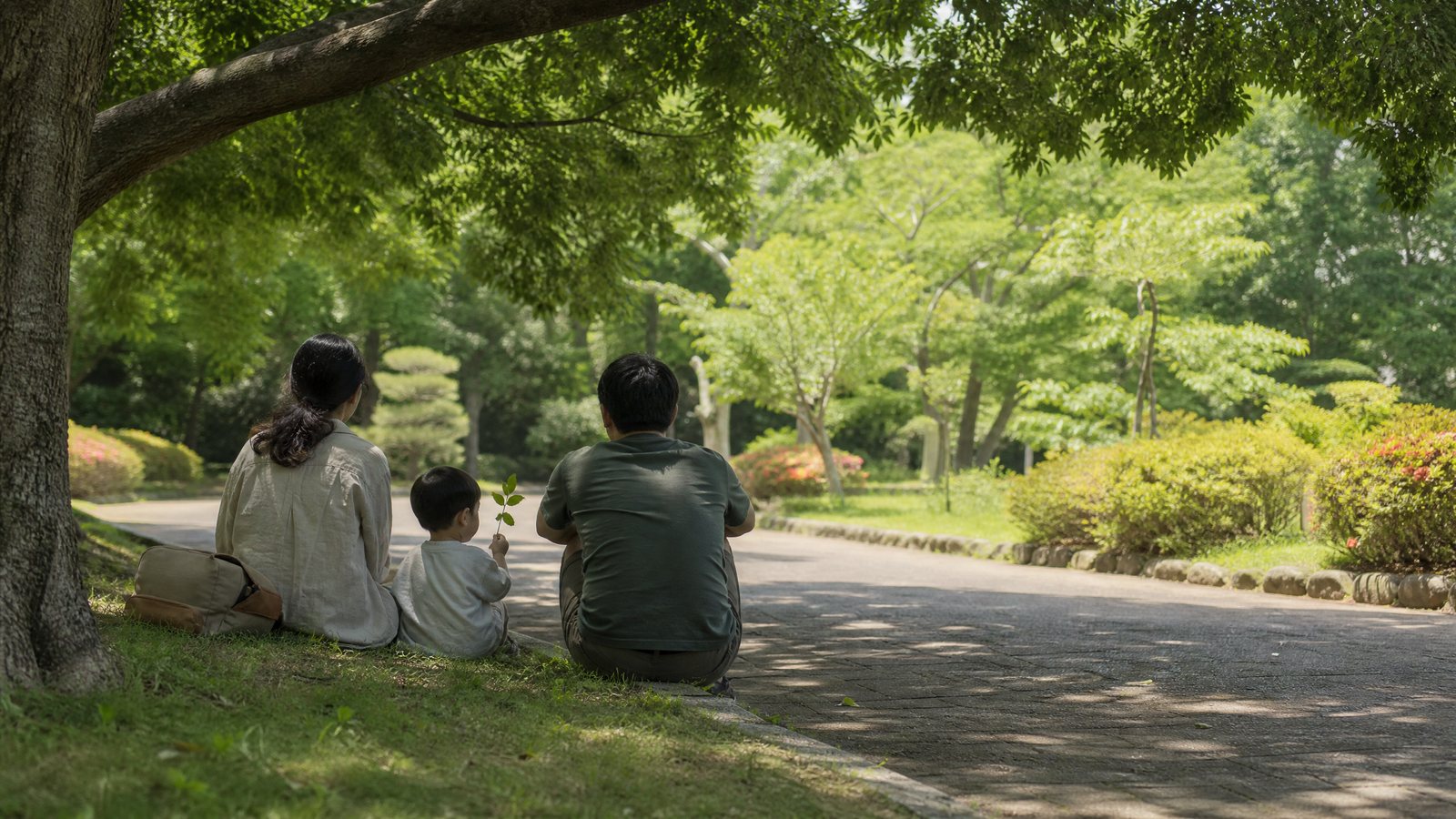 Parent and two children walking a quiet lane toward a village market at morning